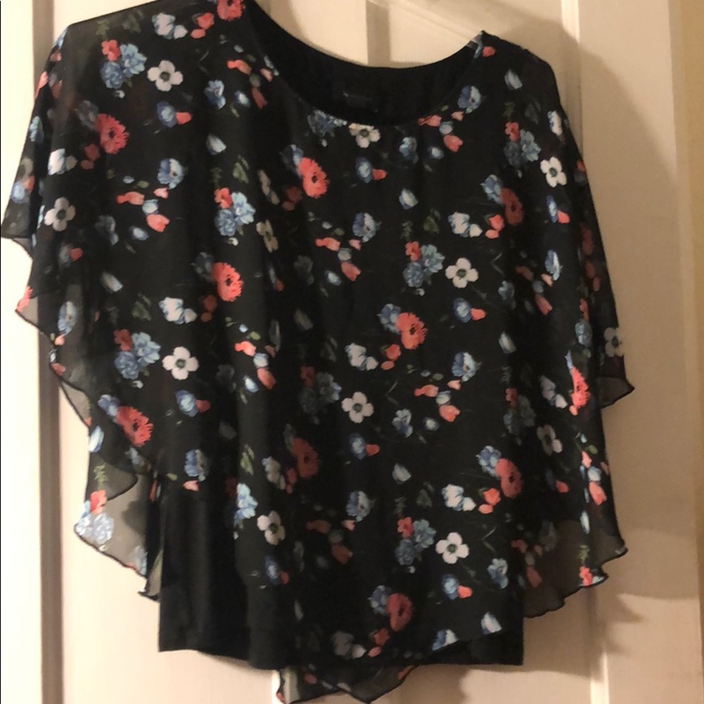 Tank with floral overlay